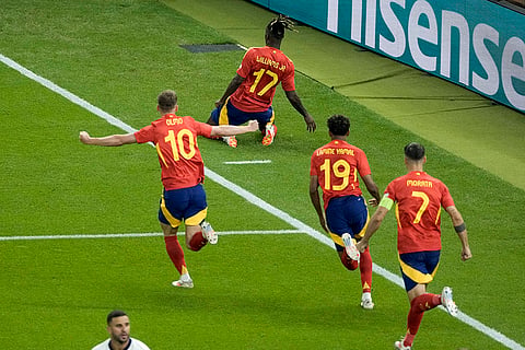 Nico Williams celebrates after scoring a goal against England